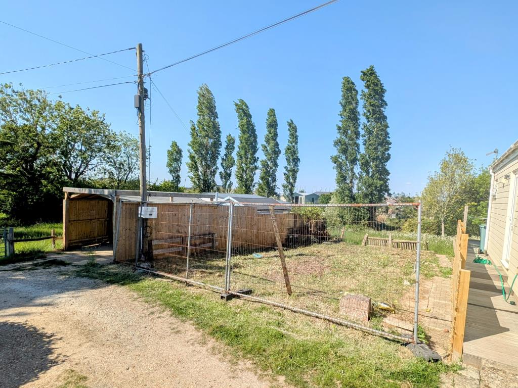 Lot: 92 - LAND WITH PLANNING FOR A DETACHED CHALET STYLE HOME - A Ground level View of the Plot